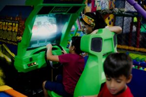 children playing video games at indoor party venues