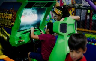 children playing video games at indoor party venues