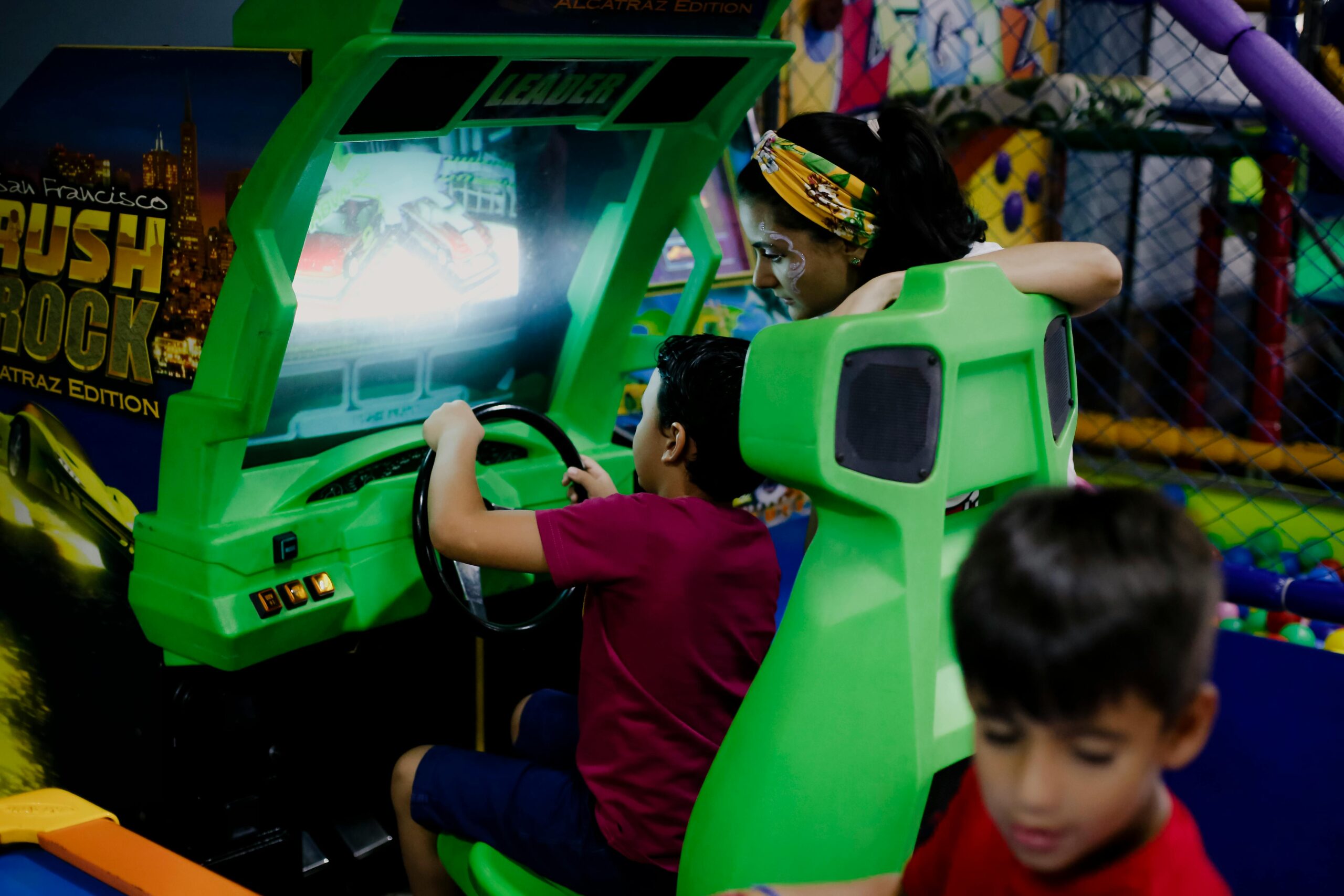 children playing video games at indoor party venues
